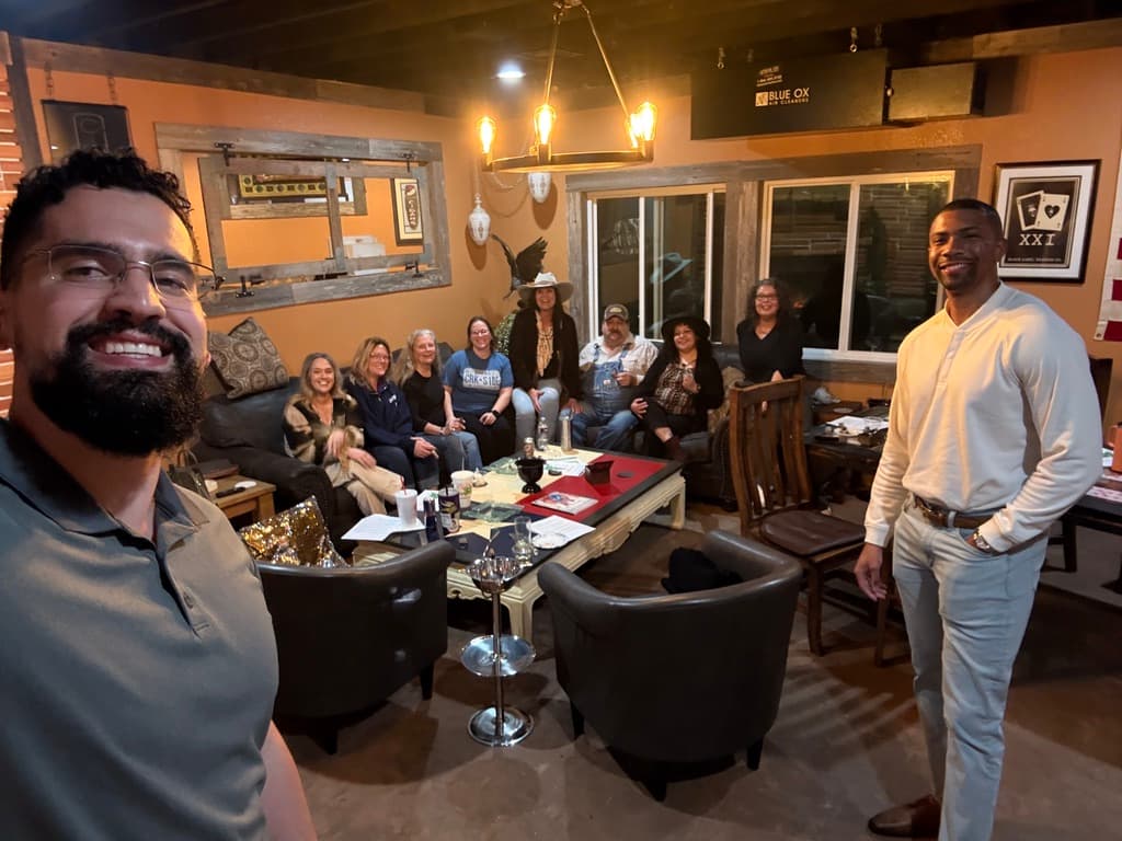 Mayfin team gathering with a cigar lounge community
